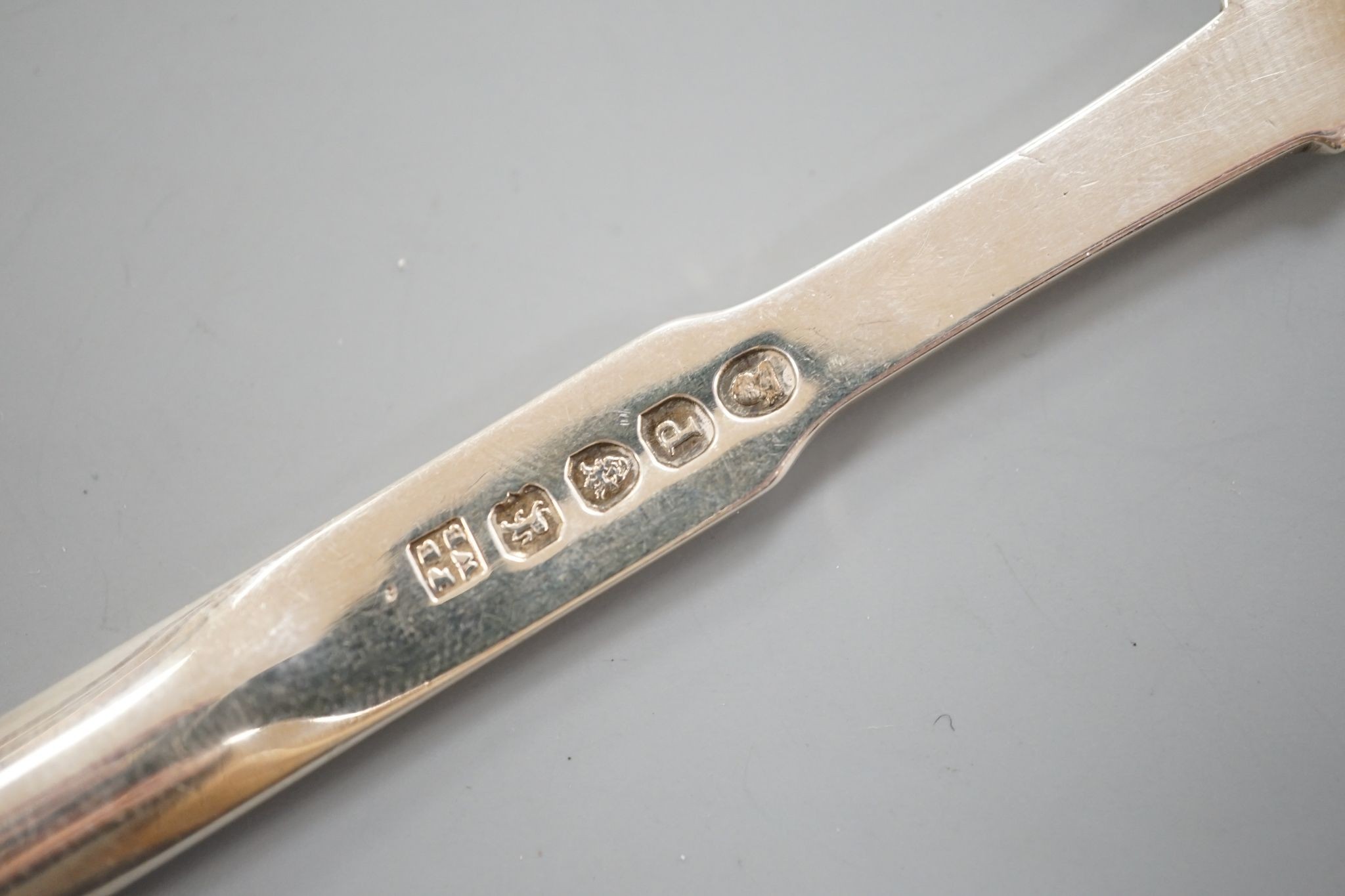 A George III silver marrow scoop, with engraved crest, Peter & William Bateman, London, 1810, 24.6cm, 56 grams.